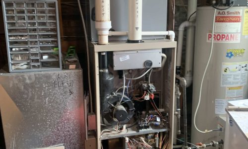 hvac direct technician installing furnace